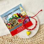 Manilla roja con corazón amarillo