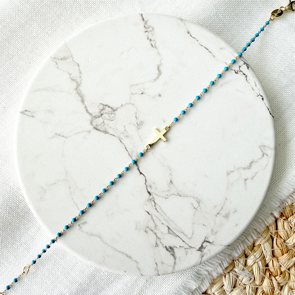 Detalle de la Pulsera Cruz Pipos Turquesa